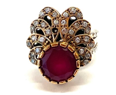 Ladies silver ruby and stone set dress ring 