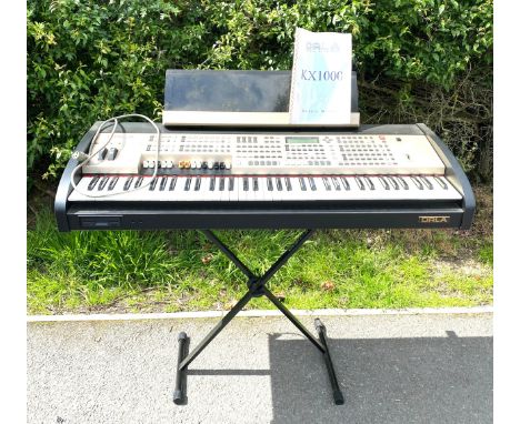 Orla KX 1000 organ with stand, lead and manual, working order 