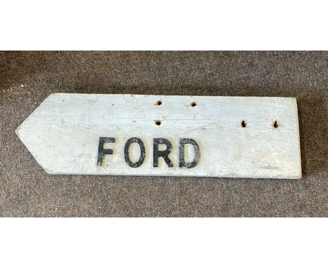 Wooden vintage arrow Ford sign, approximate measurements: 24 inches by 7 inches 
