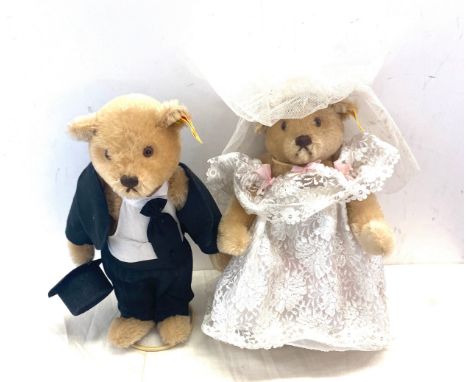 Pair of husband and wife steiff bears, measuring 11.5" in height. 