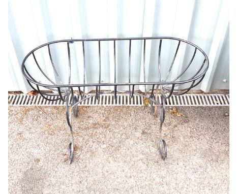 Metal garden planter measures approx 21 inches tall 34 inches wide 