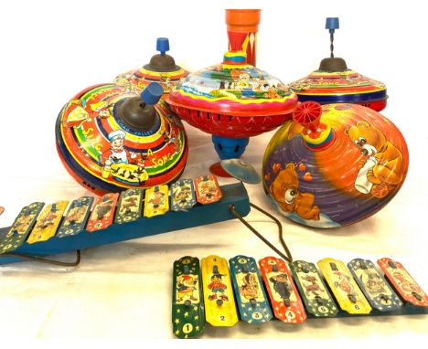 Selection of vintage metal toys includes Chad Valley sing a song spinning tops, kaleidoscope etc 