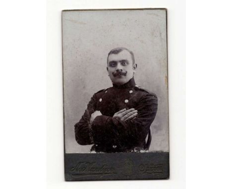 A photo measuring 10.3 cm x 6.6 cm, showing the Tsar's soldier in the atelier. Photo taken in a photo studio in Odessa by M. 