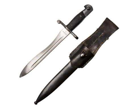 Spanish bayonet produced by the "Fábrica Nacional de Toledo" company for the Mauser carbine. The bayonet is signed FNT on the