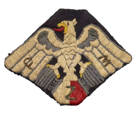 Polish Motor Association patch, in the form of an eagle sitting on the engine cylinders, with the initials PZM visible on the