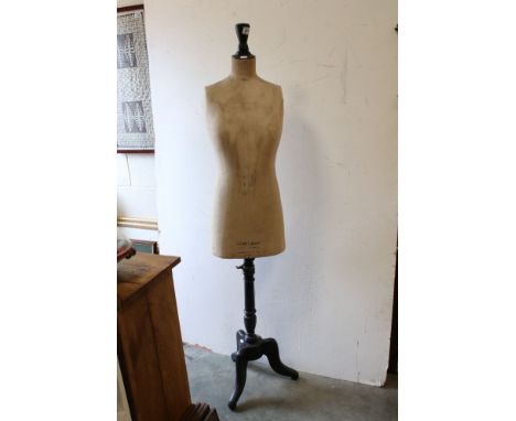 A vintage dress makers mannequin marked Stockman Paris / London. 