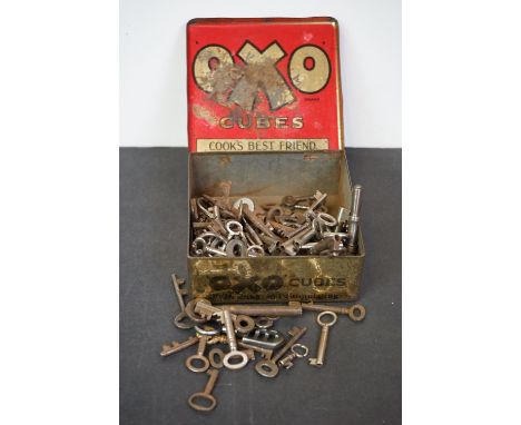 Quantity of smaller caddy/box keys in an OXO tin 