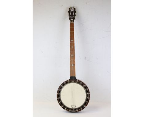 A vintage five string banjo with mother of pearl inlay to fret board. 