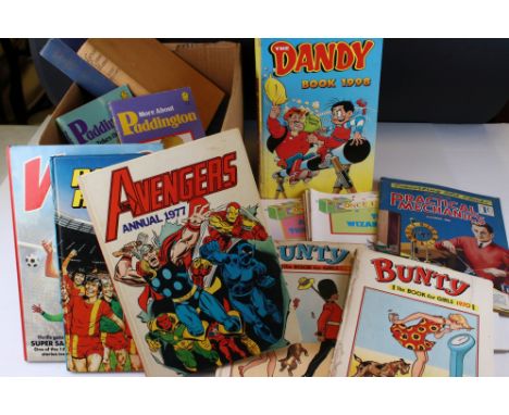 A mixed collection of vintage books and comics. 