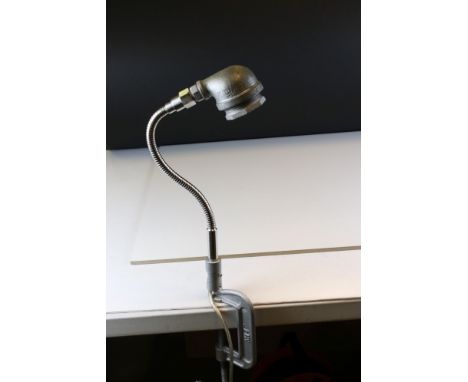 A steam punk style Clamp shelf lamp. 