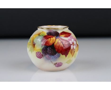 A Royal Worcester vase of squat form decorated with Berries and Leaves signed K Blake. 