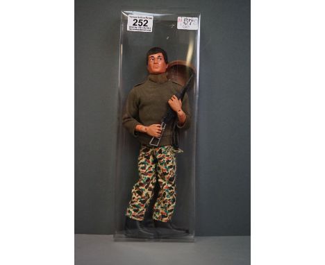 A vintage Action Man 'Talking Commander'in combat uniform. 
