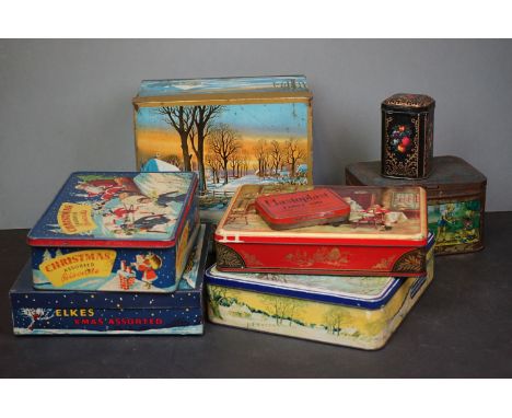 A collection of vintage advertising tins mainly Christmas examples. 