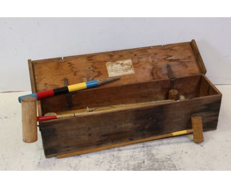 A vintage garden croquet set in original wooden box. 