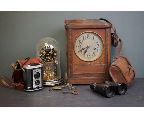 Early 20th century Oak Cased Mantle Clock, Kundo Anniversary Clock, Leather Cased Binoculars and a Brownie Reflex Camera 