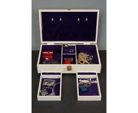 A collection of vintage costume jewellery and coins contained within jewellery box. 