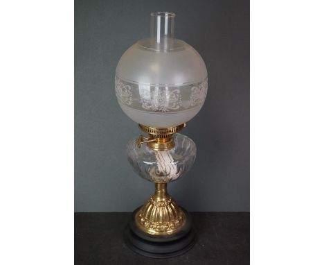 A antique brass and cut glass Duplex oil lamp. 