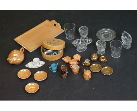 A collection of dolls house tea and dinner service items together with a woodwork tapestry of a spaniel. 