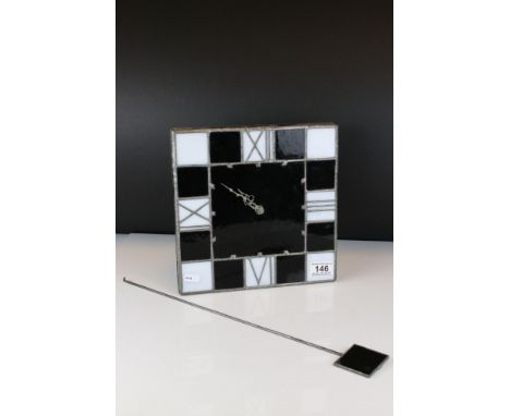 Black and White Stained Glass Effect Wall Clock with Pendulum (battery operated), 26cms high 