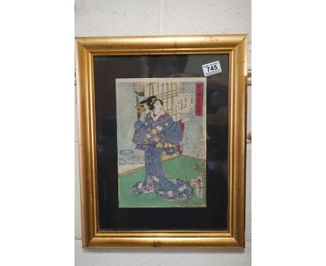 Signed antique Japanese woodblock portrait of a female figure in an interior setting 