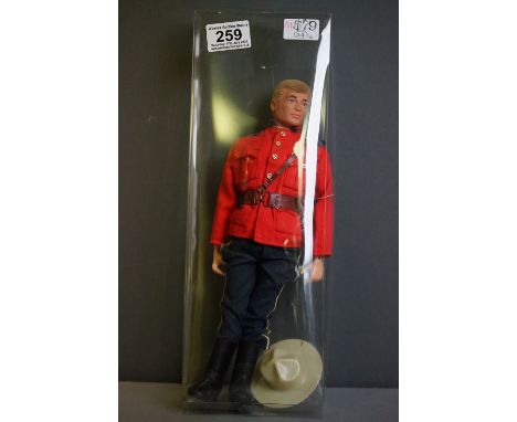 A vintage Action Man in Canadian mounted police uniform. 
