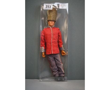 A vintage Action Man figure in guards uniform. 