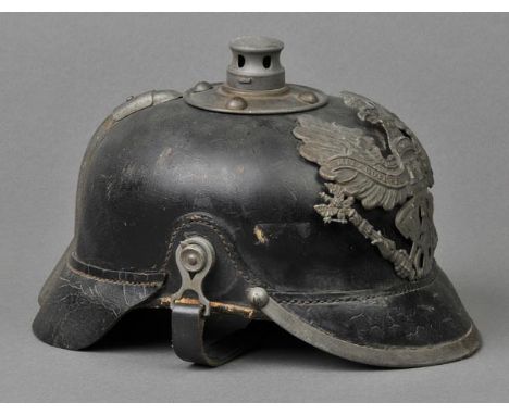 *WWI Helmet. Prussian picklehaube,  with aluminium eagle helmet plate, leather skull and flattened pommel, original leather l