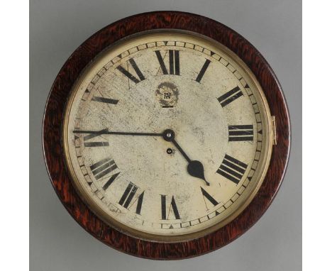 *RAF Station Clock. A good Royal Air Force station clock, circa 1930s,  the circular white enamel dial with black roman numer
