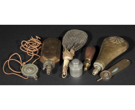 *Cap Dispenser. A late 19th-century nickel percussion cap dispenser,  with repeating engraved decoration and steel mounts and