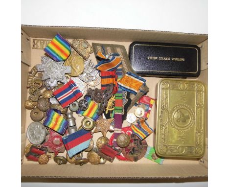 *Medals & Cap Badges. A WWI Princess Mary Christmas tin with original cigarettes and tobacco and Christmas card in envelope, 