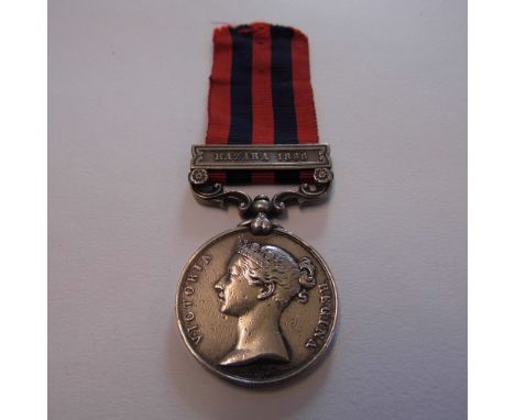 *India General Service 1854-95, one clasp, Hazara 1888 (Pte S. Guile 2nd Bn R Suss R.),  naming worn, heavy contact marks, go