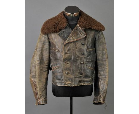 *Third Reich. A Luftwaffe leather flying jacket,  with brown "fur" collar, silver bullion epaulettes with yellow piping, leat