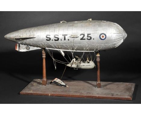 *WWI Airship. An early 20th-century wooden model of a RAF Sea Scout Twin,  painted in silver with recognition number S.S.T. 2