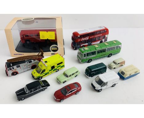 12x N Gauge Diecast Vehicles - Including Buses, Fire Engine, Ambulance etc - 11x Unboxed, 1x Boxed. P&amp;P Group 1 (£14+VAT 
