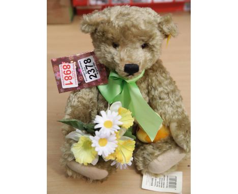 Steiff 35cm Spring bear with growler, holding daffodils plus a Steiff duck, both with tags. P&amp;P Group 1 (£14+VAT for the 