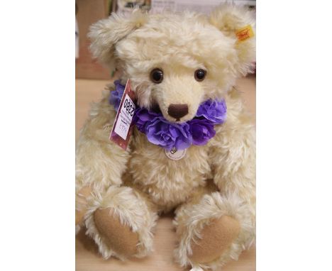 Steiff classic blonde 45cm bear with growler, wearing purple flower ruff with all labels and tags. P&amp;P Group 1 (£14+VAT f