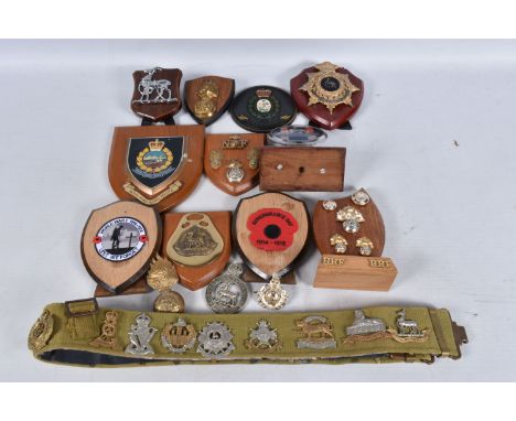 A COLLECTION OF ROYAL WARWICKSHIRE REGIMENT PLAQUES AND CAP BADGES, also included is a small amount of items connected to oth