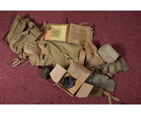 A SELECTION OF WWI AND LATER MILITARY ITEMS, this lot includes a boxed Civilian gas mask in a cardboard box and a spare set o