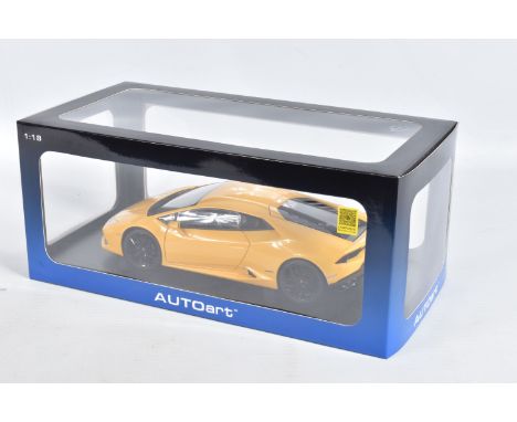 A BOXED AUTOART LAMBORGHINI HURACÁN LP 610-4 1:18 MODEL VEHICLE, numbered 74604, in yellow, appears in new condition inside i