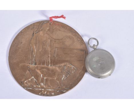 A WWI MEMORIAL PLAQUE AND 1917 COMPASS, the plaque has had the name scratches out and the compass does not work but is in a 1