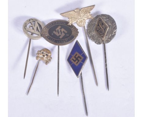 SIX VARIOUS NAZI GERMANY STICK PINS, these include one with D&amp;B inside a triangle, a gold Swastika on a blue enamel backg