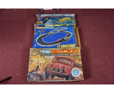 A BOXED SCALEXTRIC RALLY CROSS MODEL MOTOR RACING WITH HIGH SPEED BANKING SET, poorly kept set with a red and dismantled yell