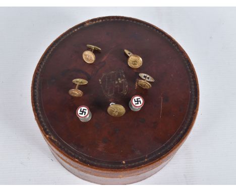 THREE PAIRS OF NAZI GERMANY CUFF LINKS AND A BUTTON, the first pair has the SS symbol inside a wreath, solid bar,  the second