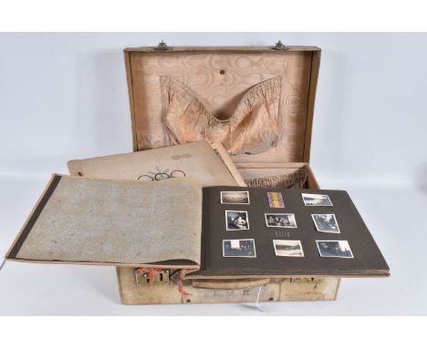 TWO 1936 BERLIN OLYMPIC ALBUMS OF PHOTOGRAPHS, ticket stubs, stamped postcards, the first album contains photos from 1936 and