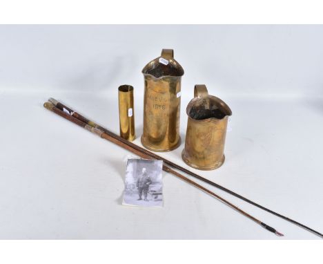 THREE PIECES OF TRENCH ART AND TWO MILITARY RIDING CROPS, the trench art includes two 1917 dated shells made into jugs and a 