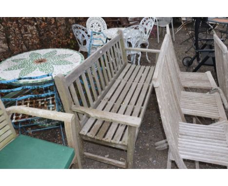 A teak three seater garden bench