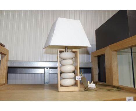 A modern design wooden and pottery table lamp with shade