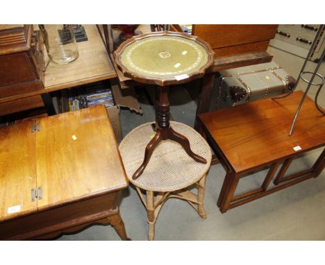 A mahogany wine table on tripod base together with a wicker occasional table