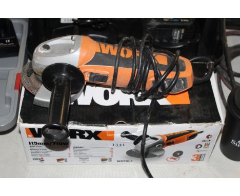 A Worx WX701.1 240v angle grinder with original box, adjustment tools, spare disc and manual