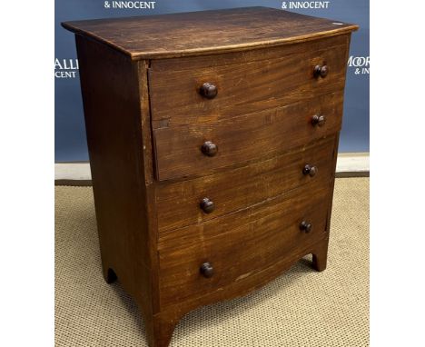 A 19th Century mahogany bow fronted commode chest, the plain top above four dummy drawers rising to reveal a mahogany cupboar